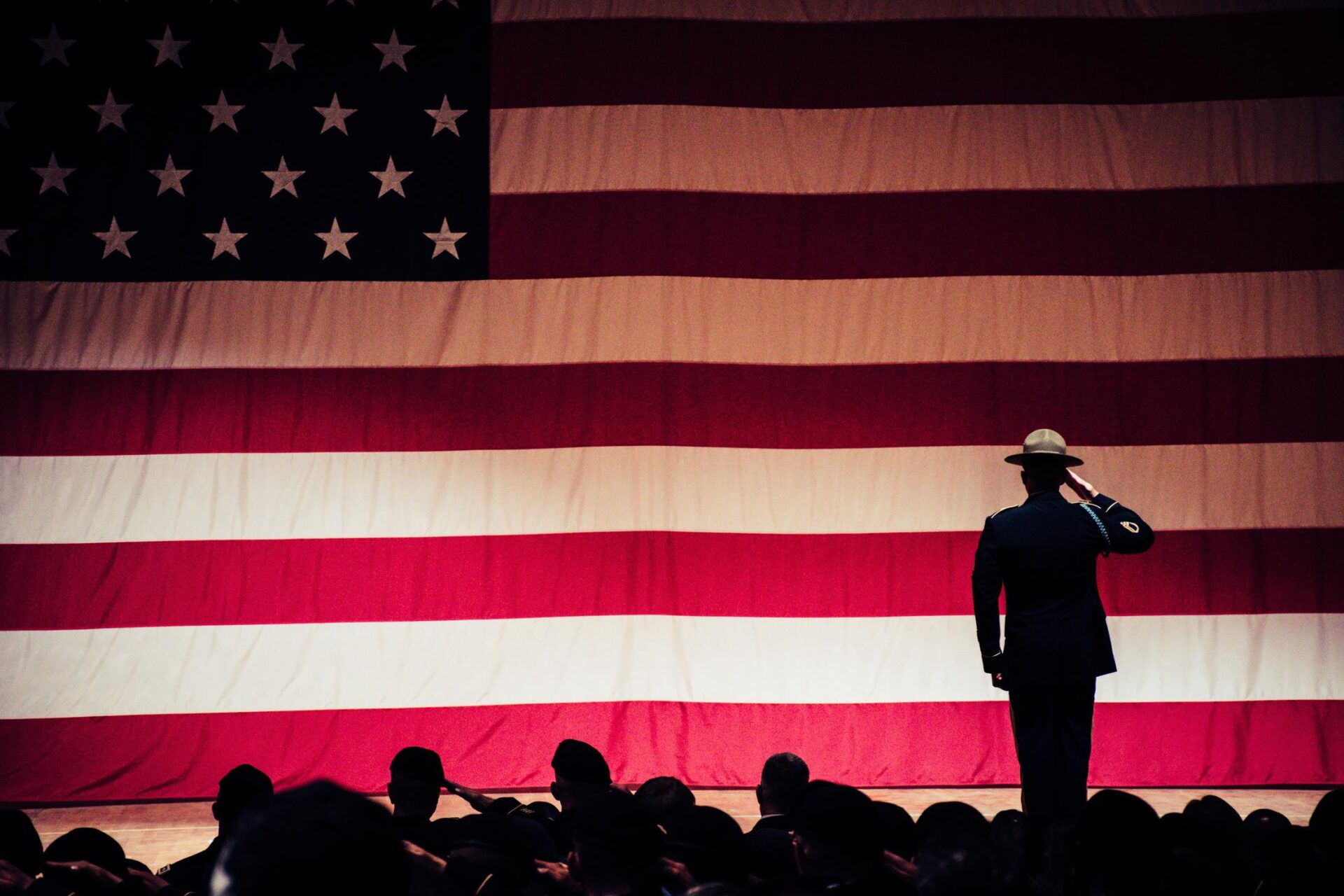 A soldier giving a salute to the flag