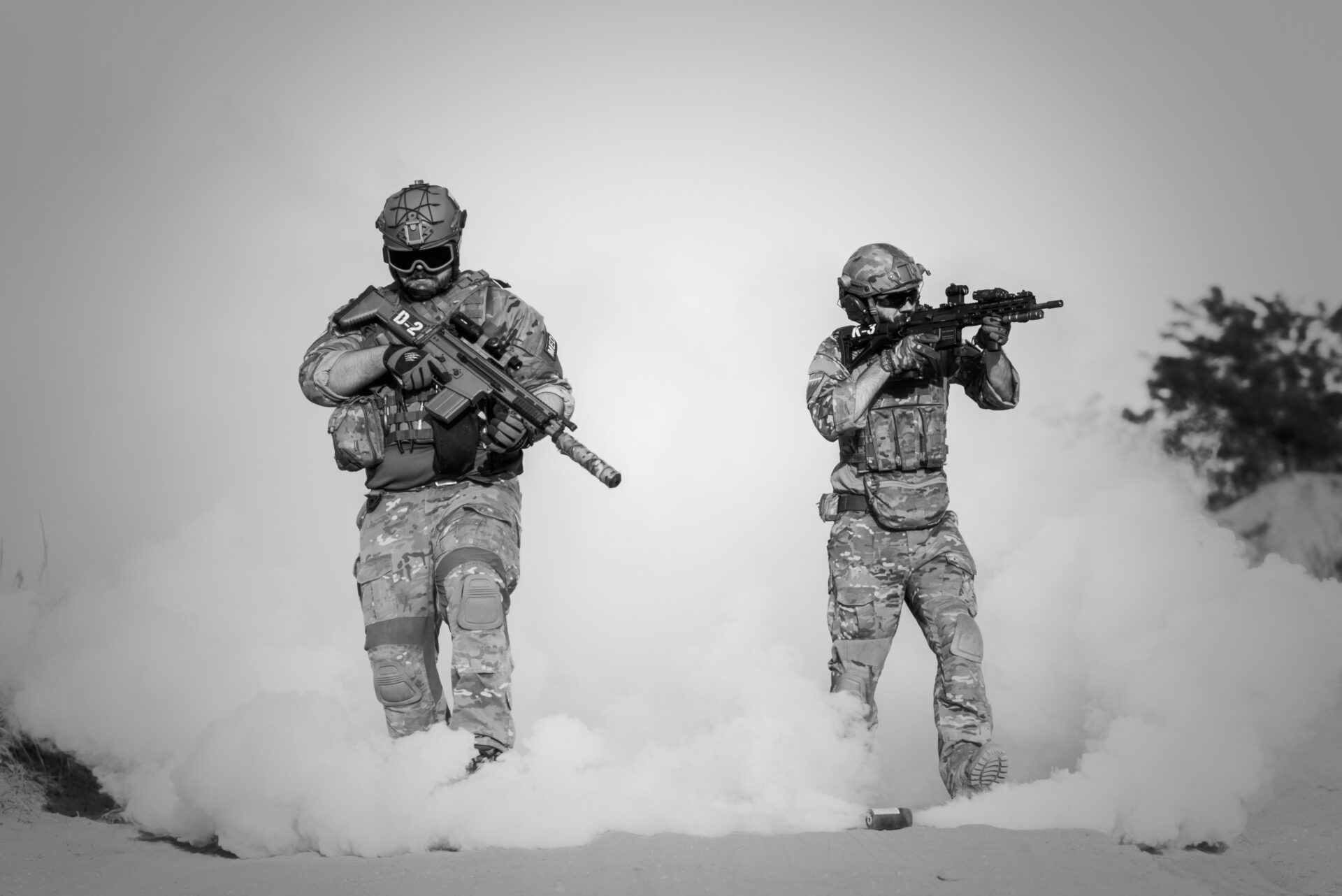 Two soldier with a smoke on the background